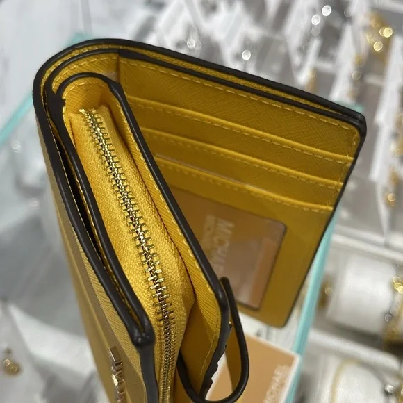 Michael Medium Crossgrain Leather Bifold Wallet
Daisy Yellow 
NWT - Picture 9 of 16